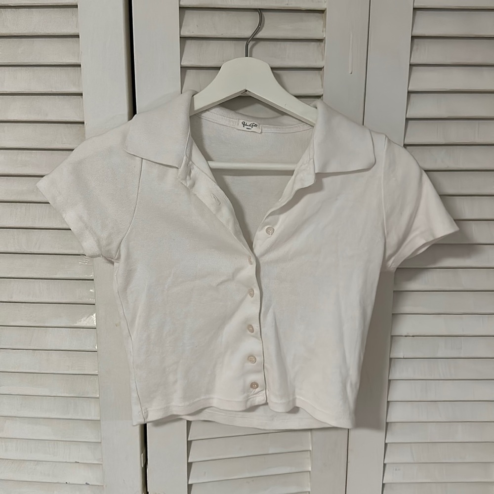 John Galt. Size: Small. Color: white.